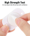 Close-up of 24 Pcs Self Adhesive Caster Wheels Set 360 Degree Swivel Mini Appliance Wheels adhesive backing being peeled off.