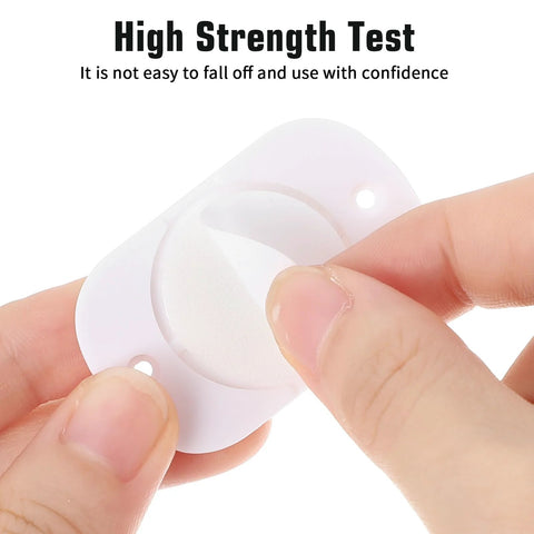 Close-up of 24 Pcs Self Adhesive Caster Wheels Set 360 Degree Swivel Mini Appliance Wheels adhesive backing being peeled off.