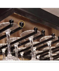 Close-up of Red Wall Mounted Wine Glass Holder with high-legged bracket and adjustable suspension rod holding tall glassware.
