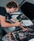 Mechanic using 360 Degree Four Way Articulating Borescope With Tiny 0.26 Inch Probe Pro Grade Endoscope in car engine