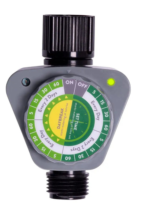 Daybreak Programmable Hose Watering Timer With Sunrise Sensor Or Set Time Option, gray with dial and green light indicator.