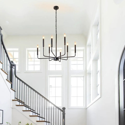 Six Light Black Farmhouse Chandelier With Candlestick Arms For Dining Room, Living Room, Foyer And Kitchen hanging in modern foyer.