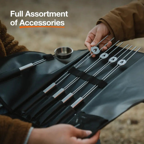 Hands displaying full assortment of accessories for Tabletop Smokeless Fire Pit With Stand 7 Inch Stainless Steel Bonfire