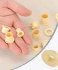 Four Piece Pack Of Precision Flanged Sleeve Bearings Crafted From High Grade Pom Plastic providing smooth spin in hand.
