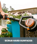 Deluxe Accessory Kit For Hydroshot Power Washers With Rotary Brush Squeegee Soap Dispenser in use for scrubbing wooden deck