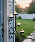 Solar Powered Tea Lights Six Pack Flameless LED Candles in metal holder at dusk in garden