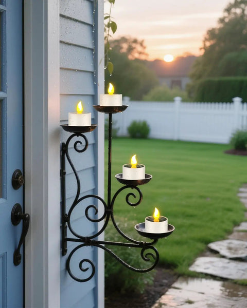 Solar Powered Tea Lights Six Pack Flameless LED Candles in metal holder at dusk in garden