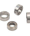 Premium Steel RC Ball Bearings Deliver Slick Low Friction Rolling And Gnarly Track Performance For Tough 1/16 Scale Remote Control Rigs Compatible With Scy Repair Kits - close-up of four steel ball bearings.
