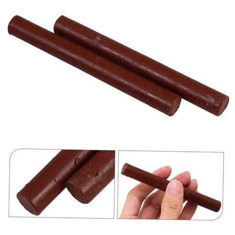 Dark Brown Wood Repair Kit Wax Filler Sticks For Floors Cabinets And Surfaces Easy To Use No Mess Scratch Repair Crayons That Hide Scuffs And Scratches Fast Fix For Furniture shown in hand and close-up
