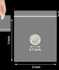 Clear 3 By 3 Inch Reclosable Zip Bags Pack Of 1200 2 Mil Thick Food Safe Poly Bags With Resealable Zipper shown with coin for size