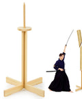 43 Inch Solid Pine Kendo Tameshigiri Practice Cutting Stand with varnish finish. Shows product setup with a swordsman in action.