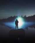 Person standing on rock with Flateye High Performance Flashlight With Cree LED Multi Position Beam Waterproof And Shockproof 1700 Lumens