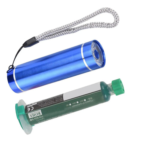 Blue UV curing lamp and green solder mask from BGA Reball Stencil Solder Mask Kit With UV Curing Lamp For PCB Repair And Prototyping Boards Solder Mat And Pad Mask Tools DIY Friendly Easy Cut Stencils For Precise Reballing Local Chip Damage Repair Complete Tool Kit.