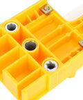Close-up of the yellow Rock Solid Doweling Jig Kit 38 Piece Self Centering Woodworking Drill Guide with metal inserts.