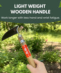 Person holding Hounen Miyawaki Japanese Weeding Sickle Twisted Stainless Kama Weeder With 4.7 Inch Blade And 13 Inch Wood Handle in garden