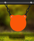 AR500 Steel Gong Target Set With Chains 3/8 Inch Thick 4, 6, and 8 Inch Neon Orange Targets For Outdoor Range Day And Shooting Practice Laser Cut Edges For Smooth Durable Hits Every Time hanging in outdoor setting.