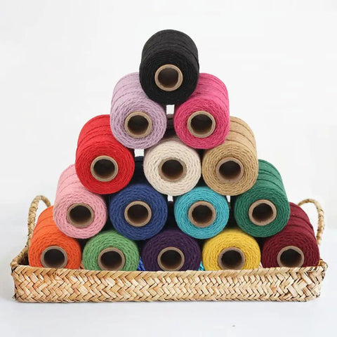 Colorful spools of Macrame Cord 1.5mm Cotton String Rope for DIY Crafts 109 Yards arrayed in a basket