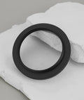 M48 To M54 Telescope Thread Conversion Adapter for Photography Lenses on white surface, black anodized aluminum ring