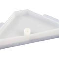 Close-up of a white plastic triangle bracket with off-center screw hole, part of 12 Pack 90 Degree Cabinet Triangle Brackets.
