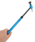 Pro Grade Multi Head Paintless Dent Removal Hammer Kit showing blue aluminum handle and metal head for precise dent removal.