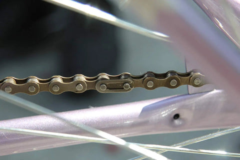 Close-up of a single speed bike chain for fixed gear and mountain bikes one half by one eighth inch 116 links tough as nails