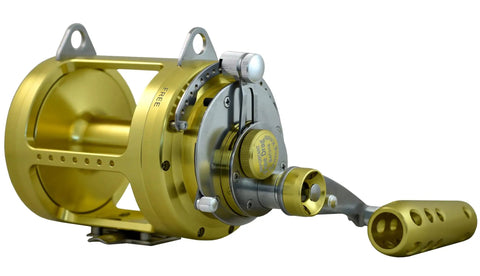 Beefy 50W Two Speed Twin Drag Fishing Reel Big Game Saltwater Trolling, gold anodized finish, stainless gears, side view