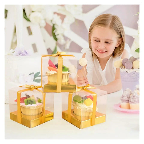 Child admiring cupcakes in Golden Cake Gift Boxes 30 Pack With Clear Viewing Windows Premium Dessert Packaging at party