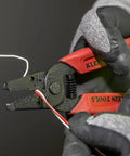 Made In USA Compact Wire Stripper And Cutter For 16 To 26 AWG Stranded Wire shown cutting wire