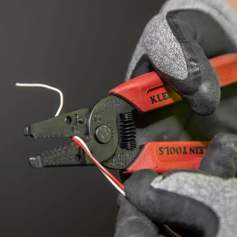 Made In USA Compact Wire Stripper And Cutter For 16 To 26 AWG Stranded Wire shown cutting wire