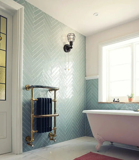 Industrial Farmhouse Style Ceiling Light With Pull Chain One Light Black Semi Flush Mount Adjustable Metal Cage in bathroom.