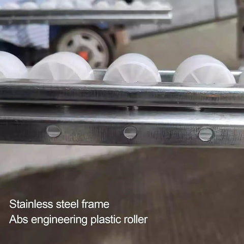Close-up of Heavy Duty Gravity Roller Conveyor 1.3 Ft Wide By 6.5 Ft Long with ABS plastic rollers and stainless steel frame.
