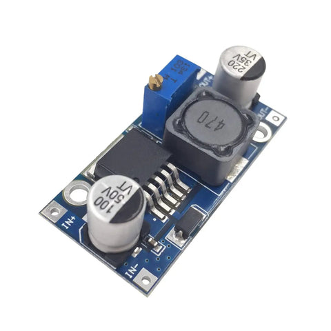 LM2596 regulator module from 6 Pack DC To DC Buck Converter Kit, showing capacitors and sockets for DIY electronics projects use.