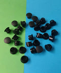 Thirty Pcs Black Plastic Hole Plugs For Cabinet And Screw Holes, 13 Mm Bottom Diameter, spread on colorful surface