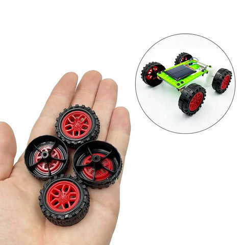 20 Pack Toy Car Wheels With 10 Metal Axles For RC Cars And DIY Bots, Red Plastic Wheels 30mm Dia, held in hand