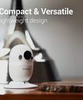Compact CapsuleCam Pro Baby Monitor from 4 Pack 1080p HD WiFi Indoor Security Cameras with phone app 2 way audio on table