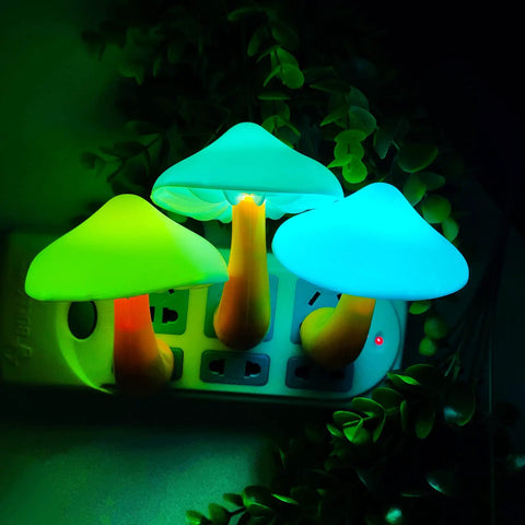 Two Pack LED Mushroom Night Lights Plug In Wall Lamps With 7 Color Changing Sensor glowing in green and blue