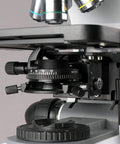 Trinocular Metallurgical Microscope With Episcopic And Diascopic Viewing, Pro Grade Optical System, Seven Magnification Settings Up To 2000X, Infinitive Plan Achromatic Optics, 100W Epi And Transmitted Halogen Illumination, Lab Ready close-up of objectives and stage