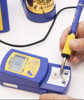 FM2027-01 Soldering Iron With Grip And Heatproof Pad for FX951 FX952 FM203 FM204 FM206 Stations, shown with digital display