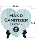 Heart Shape Hand Sanitizer Station Sign With Sturdy Black Easel Stand 6X5 Inch Wood Finish Tabletop Counter Decor For Beauty Salon Retail Shop Or Home Office Keep Your Setup Fresh And Looking Dope Day One, showing dimensions 6x5.4 inches.