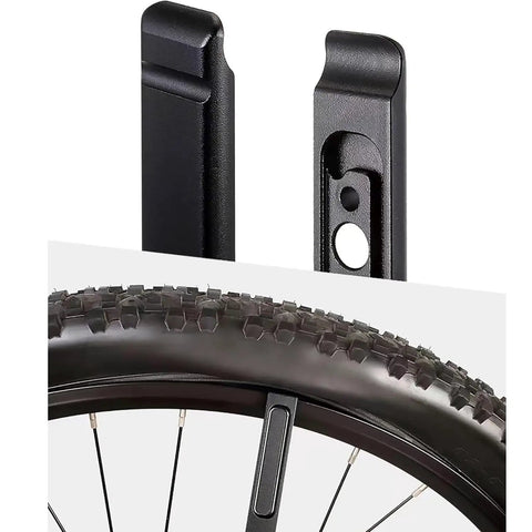 Close-up of tire levers on mountain bike wheel, part of 4 In 1 Bike Chain Quick Link Tool With Master Link Pliers, Quick Link Opener And Closer, Tire Levers, Chain Hook And Storage Clasp, A Handy All In One Bike Repair Kit For Mountain Road And BMX Bikes