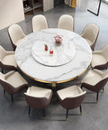 Kickback Ready Round Marble Dining Table Built For Epic Weekend Hangouts Featuring A Smooth White Spinning Lazy Susan And Bold Gold Stainless Steel Base Stretching Fifty Nine Inches Wide with plush chairs.