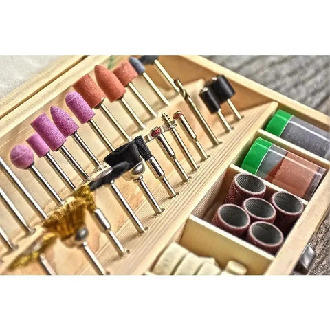 Hella Versatile 100 Piece Rotary Tool Accessory Set Featuring 1/8 Inch Shank Abrasive Burrs and various polishing tips in wooden case.