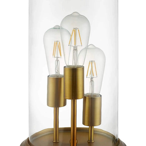 Close-up of Vintage Brass Glass Cloche End Table Lamp With Industrial Modern Vibe showing bulbs within glass cloche cover