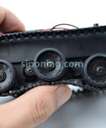 Close-up of rubber track and suspension system on Mini Smart Robot Tank Chassis Kit With Rubber Track Crawler For Arduino And 130 Motor.