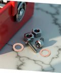 Must Have Go To 20 Piece Flat Copper Washer Kit For Automotive And Plumbing, High Precision Sealing Gaskets For Oil Drain Plug And Hydraulic Fittings, Copper Washers For Leak Free Performance And Quick Heat Dissipation. Flat copper washers with nuts and bolt on a marble surface