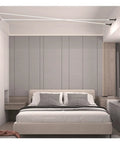 Effortlessly Sleek Modern Linear LED Wall Sconces With Remote Control For Cozy Bedroom And Living Room Vibes A Total Game Changer For Your Glow Up In Black Finish Dimmable Lighting in a stylish bedroom setting.