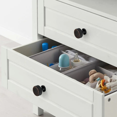Slick Knurled Grip Cabinet Knobs And Drawer Pulls Finished In Matte Black With A Heavy Duty Zinc Core Designed To Level Up Any Kitchen Or Bath Quick Screw Mount Setup Drops In Ten Solid Bundles on a white drawer with organized items.