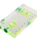 Transparent Bubble Level showing dual vials and built-in ruler, measuring 95 x 51 x 13 mm, ideal for leveling tasks.