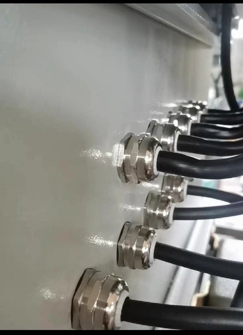 Close-up of installed Metal Waterproof M22 Cable Glands Set with Adjustable Joints for 10-13 mm Cables Durable Silver Connectors