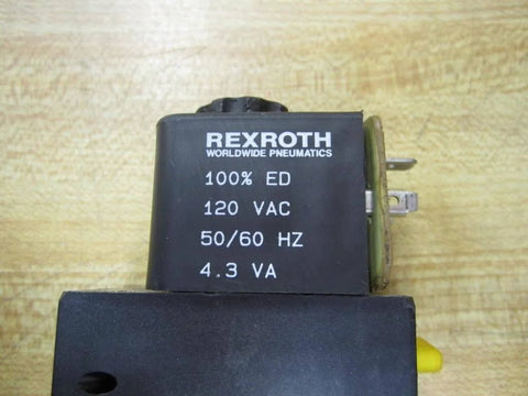 Rexroth Bosch Group 0-1313 Solenoid Valve, 120 VAC, 4.3 VA coil close-up on brown surface, visible electrical specifications.